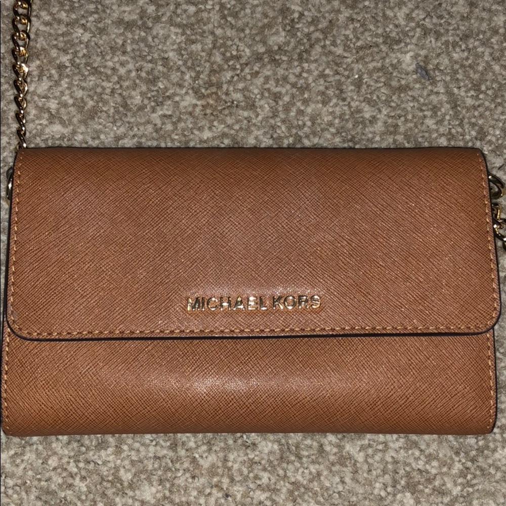 Micheal Kor’s light brown purse